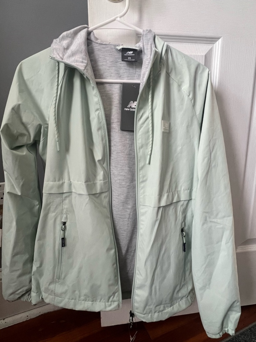 New Balance Women's Mint Green Hooded Lightweight Jacket